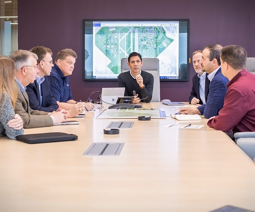 leadership team meeting at a conference table