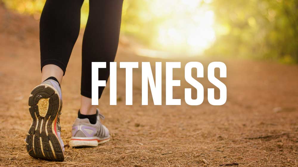 Photo of woman running with logo saying FITNESS