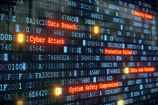 Computer data stream image with words such as Data Breach, Cyber Attack, System Safety Compromised in text.