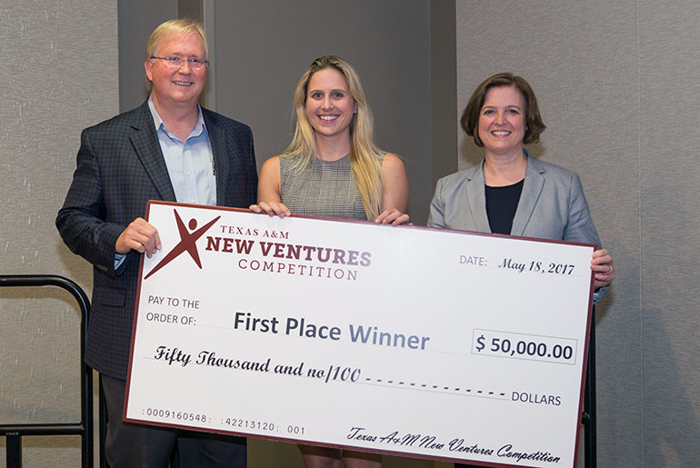 Team IntuiTap Medical receiving the check for $50,000