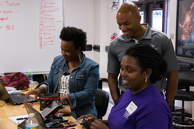 Texas A&M faculty and staff in lab