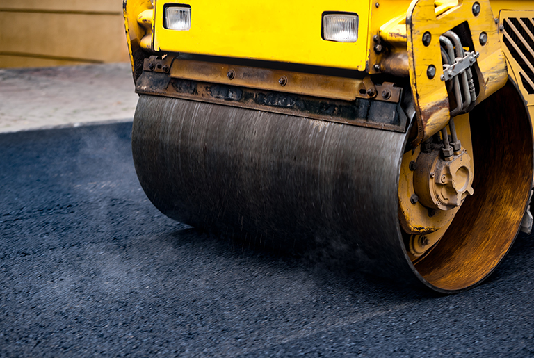 Mechanical truck on asphalt