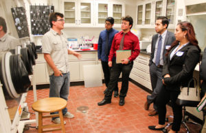 Students in Nuclear Forensics Laboratory talking.