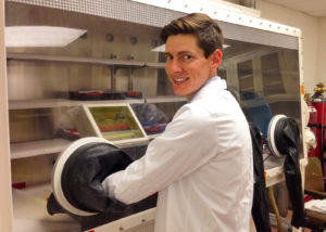Researcher Jeremy Osborn working in nuclear forensics laboratory.