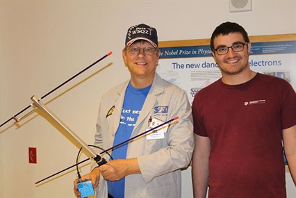 David Gent and a student at the 2018 Physics Festival