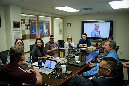 Professionals gathered in a meeting room