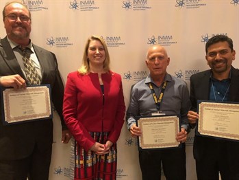 Chirayath and others receive the Institute of Nuclear Materials Management Senior Membership Appointment certificate.