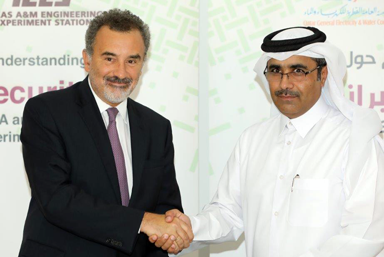 Dr. Ioannis G. Economou, representing the Texas A&M Engineering Experiment Station, and His Excellency Engineer Essa Bin Hilal Al-Kuwari