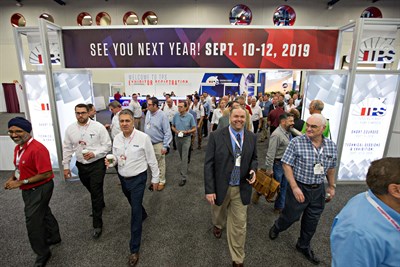 Delegates Wandering the Exhibits of the Turbomachinery &amp; Pump Symposia