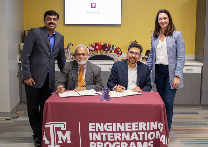 Dr. Chaitanyamoy Gangulyand and Abhinav Kapadia signing agreement