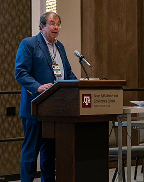 Terry Boston addressing a press conference at TAMU Hotel and Conference center