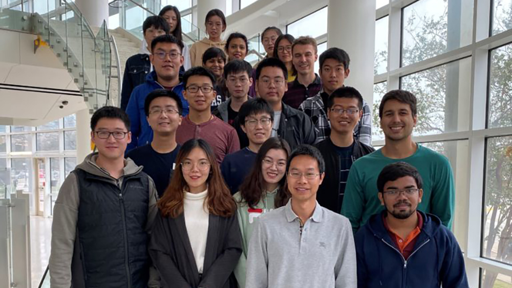 Dr. Qingsheng Wang  with his students