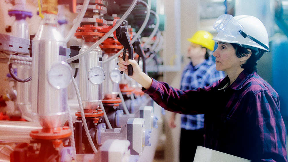 Woman working in plant.