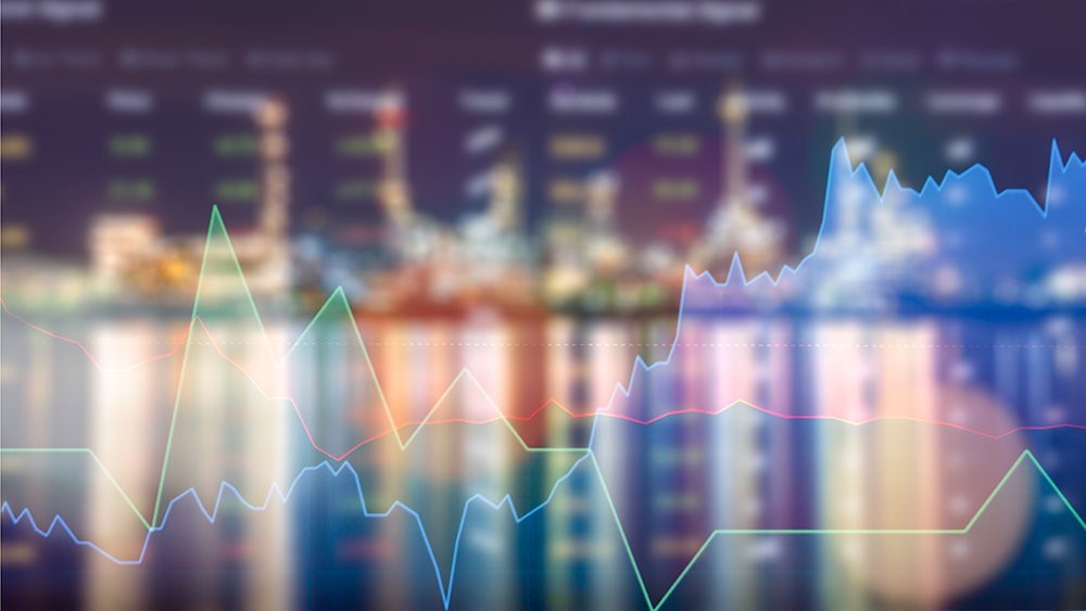 Line graph with power plant in background.