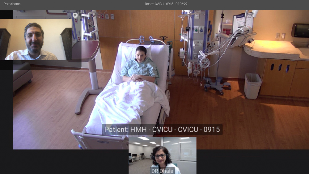 Drs. Sasangohar and Dhala testing the vICU system for visitation.