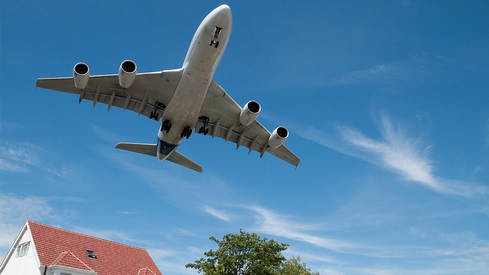 Plane descending and shown close to landing.