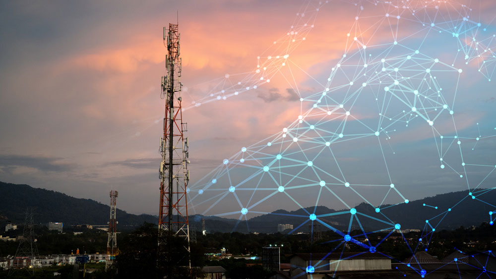 Telecommunication tower during sunset with wireframe overlaym
