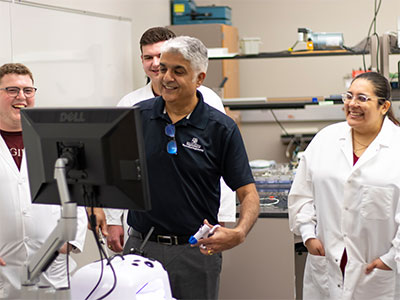 Dr. Balakrishna Haridas using a simulator to test out a pediatric device.
