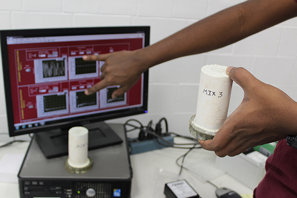 Nuclear waste permeability measurement device and computer screen screen showing the data. 